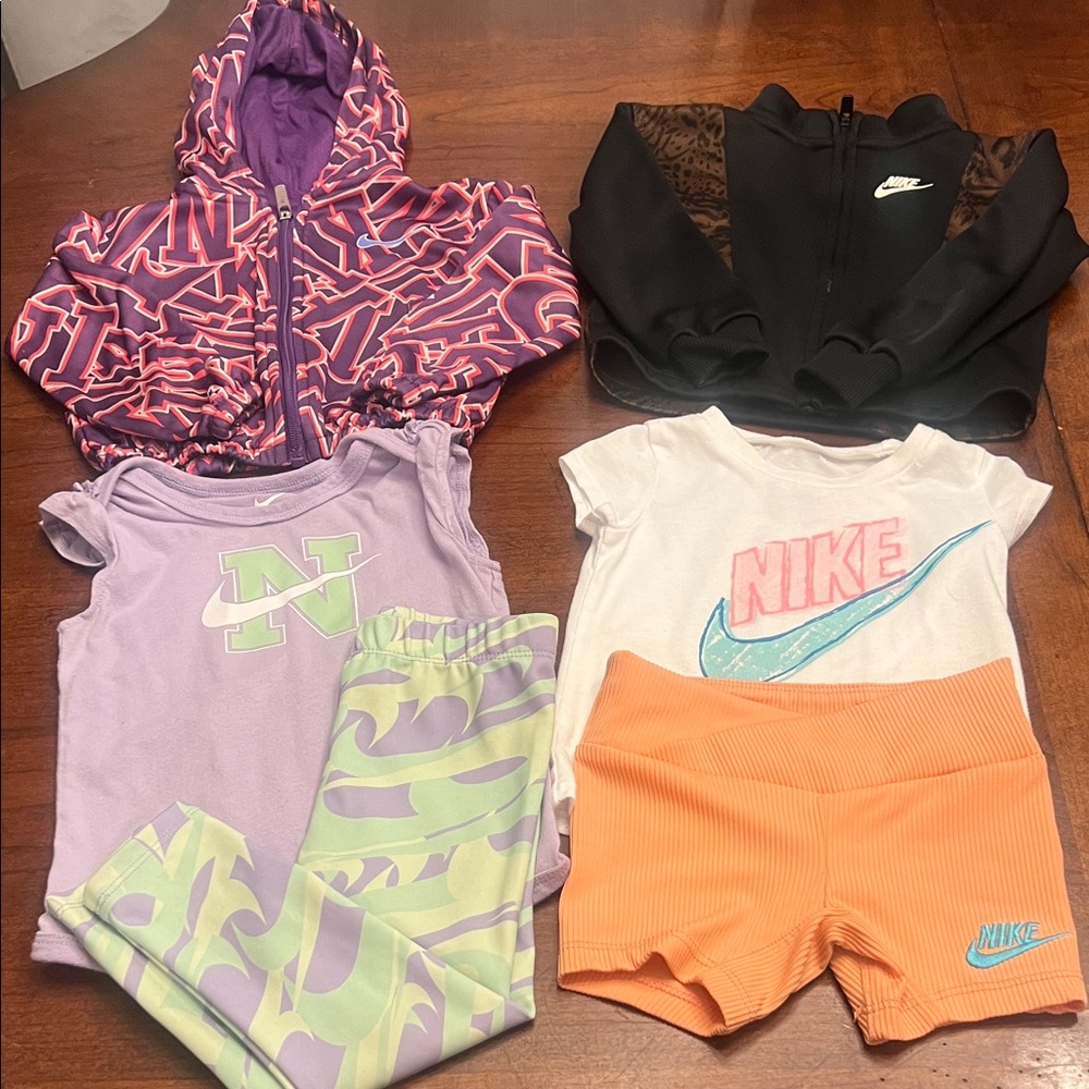 Nike Kids Apparel Set in Purple, Black, and Orange